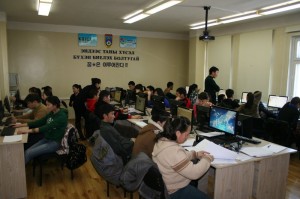 Workshop participants working at their computers.