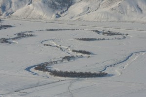 Rivers are frozen in such a way that you can easily drive an all terrain vehicle across the ice.